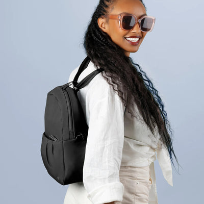 Pacsafe® CX Anti-Theft Convertible Backpack (lifestyle)